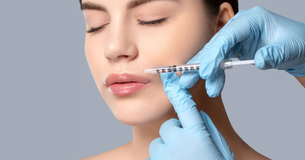 Women receiving dermal filler treatment in Delray Beach, FL