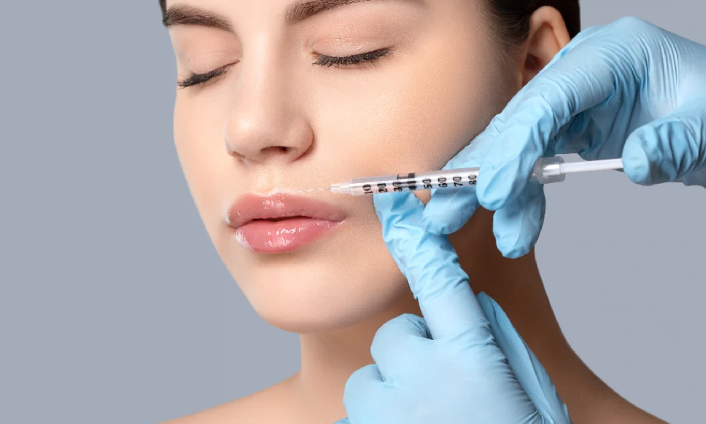 Women receiving dermal filler treatment in Delray Beach, FL
